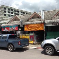 Overbrook Hospital towers in the background.  99 is in the middle with the yellow banners. at Jay 99 - Youta in Chiang Rai
