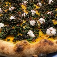 Orto di stagione: pumpkin cream, black cabbage, leeks, taggiasche olives powder, vegan mayonnaise  at Nuvole di Farina in Rome