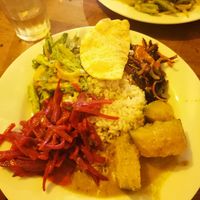 Okra, beetroot, aubergine and pumpkin curries with rice & poppadom at House of Kitchen in Ella