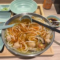 Vegan soup after ingredients are mixed in (with optional chili sauce)  at Jardín de Yunnan  in Sevilla