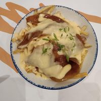 Cheesy bacon fries. at GNOU in Athens