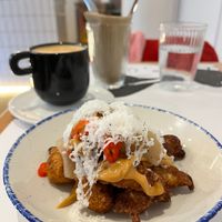 Cauliflower with cheese, pear, peanut sauce and chilli. at GNOU in Athens
