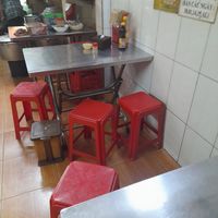 Metal tables. Plastic chairs. Perfect at Cơm Chay 390 in Ho Chi Minh City