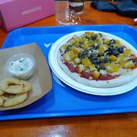 Pizza opcion con not chicken. + Mayo ciboullete con papas fritas at Dharma in Puerto Montt