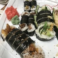 Rolls: $5 to $7. Sweet potato tempura, this plant I can’t remember the name of but tastes very pickled, asparagus tempura, veggie roll😄  at Happy Sushi in Springfield