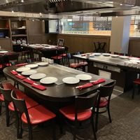 Some of the hibachi grills in the dining area at Benihana - MOA in Bloomington