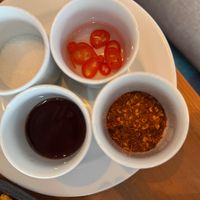 Chilli flakes, chilli with sauce at Seasonal Tastes in Bangkok
