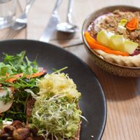 Acai bowl + toast with mushrooms and guac at Little Bird Kitchen in Auckland