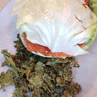 Kimchi burger with kale chips at Little Bird Kitchen in Auckland
