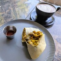 The Breakfast Burrito with a tofu scramble and Beyond Meat sausage and vegan cheese. at Witness Coffee Roasters in Eureka