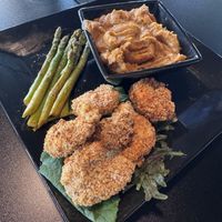 Fried shrimp with sweet potato mash & asparagus   at UnbelieVegan in Fairburn