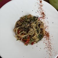 El Yaki (pasta con vegetales y tempeh). Abundante; el plato es hondo.  at Pura Vida Resto in La Barra