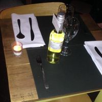 intimate, rustic and romantic tables inside at Bio Solo Organico in Buenos Aires