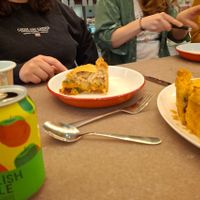 Sideview of slice of layered veg pie with flaky pastry. at Cath's Cornish Kitchen - Maybe closed in Redruth