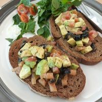 Avocado, tomatoes and olives on toast at May and Mark Restaurant in Krabi