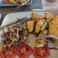 Breakfast the chef made separately for us. Mushroom, potato wedges, and lots of fruits at Revive by Ark Organics in Kampala
