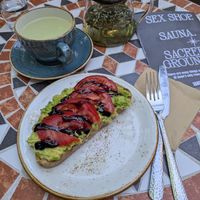Avocado and tomato toast with tea at Sacred Grounds in West London