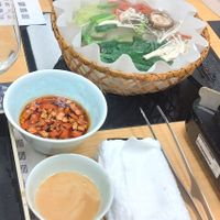 Shabu shabu with 2 sauces, the "meat" (left) and veggies (right) at Kyōto Hyōto Kyōto Ekimae Honten in Kyoto