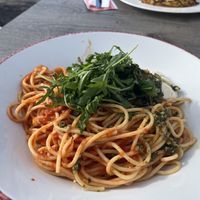 Vegan Spaghetti (with Mozavella, tomato sauce, basil pesto and rocket)  at Chüestall Blausee in Riederalp