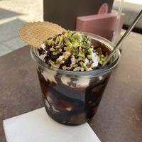 Pistazie, Toffee Nut & Zartbitter Schoki - mit Sahne und Schokosoße.   at Mica Eisdiele  in Stuttgart