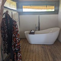 Indoor shower at Aardvark Safari Lodge in Katunguru