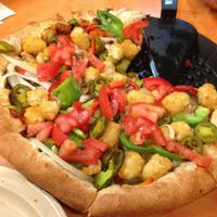 You can get tots on your pizza! Vegan pizza with tater tots added. at Woodstock's Pizza - Pacific Beach in San Diego