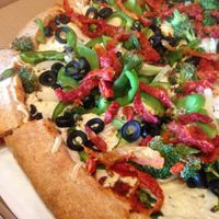 vegan pizza on whole wheat crust at Woodstock's Pizza - Pacific Beach in San Diego