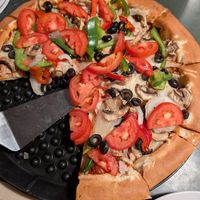 Grateful Veg pizza with vegan cheese at Woodstock's Pizza in San Luis Obispo