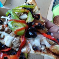 Vegan-veg extra olives , got some siracha on top I drizzled. They had it at the place at Woodstock's Pizza in Santa Cruz