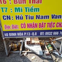 Menu board outside. Address. Phone number at Hồng Cúc in Ho Chi Minh City