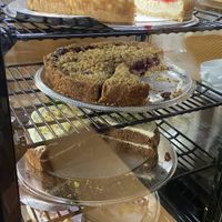Sunday 31 August 2025: cherry cheesecake, forest fruit crumble, carrot cake and white chocolate/lavender pie. All very good!  at KLUTS in Utrecht