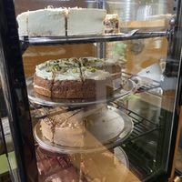 Pies 22 Dec 2025: blueberry/lemon pie, carrot cake, vanilla/praline pie and raspberry/chocolate mousse pie.  at KLUTS in Utrecht