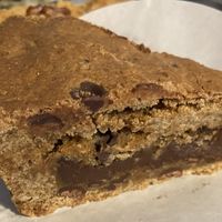 Glutenfree brownie pie: tasty. The crust is crispy (but a bit hard) and the filling is a rich and smooth ganache at KLUTS in Utrecht