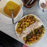 Semolina soup (starter) and main that was mix of chickpea stew, rice and "scrambled" vegetables. at Veggie House in Puno