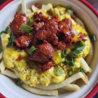 "huevos" rotos con "chorizo" riquísimo at La Madriguera in Bilbao