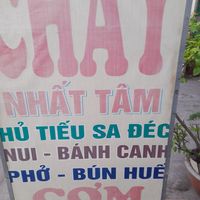 Faded old sign outside with menu at CHAY NHẤT TAM in Ho Chi Minh City