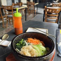 Dolsot bibimbap and outdoor seating   at Cahchi Korean BBQ Restaurant in New Malden