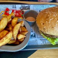 Vegan burger with french fries  at Hotel & Restaurant Fines in Santa Magdalena