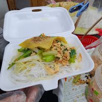 Preparing my take away vegan food at Bun Xao Chay Ngon  in Ho Chi Minh City