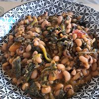 Beans with spinach, herbs and tomatoes at Gyro in Athens