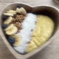 Bliss the Tropics bowl with mango, pineapple, papaya, passionfruit, banana, turmeric and coconut milk  at Bliss the Berry in Willemstad