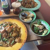 Drunken noodles, spring roles and side of broccoli  at Rosa's  in Leamington Spa