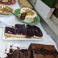dessert bar, including vegan chocolate mousse cake in foreground at Resto Vego in Montreal