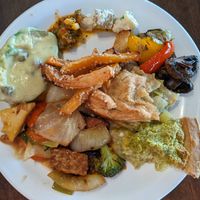 another of my plates, mostly hot dishes (including leek quiche), and an avocado half in citrus dressing with capers at Resto Vego in Montreal
