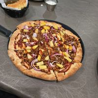 Build Your Own Pizza - BBQ sauce, red onion,  vegan sausage, and pinapple at Fratello's Ristorante & Pizzeria in Idyllwild