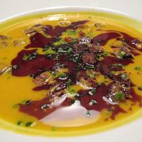 pumpkin soup with brown bread croutons, turmeric, pumpkin seed oil at Oben in Vienna