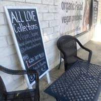 Outdoor Seating Area w/Socials and Refill Station Signs  at All Love Collections in Glendora