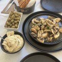 Pita, Olives, Humus and garlic mushrooms   at Au Bon Bistrot in Rhodes