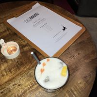 amaretto sour (they use aquafaba instead of eggwhites)   at DAS HOUSE Café & Bar in Vienna