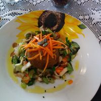 sformatino di verdure tiepido, su letto di insalata.  at Samhain Enocaffetteria in Bari